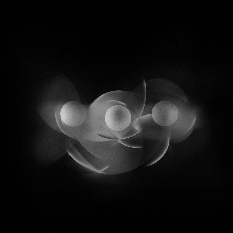 Release-Cover „Flageolets“ von Komponist und Gitarrist Kavall: Schwarzer Hintergrund mit weichen Lichtkreisen